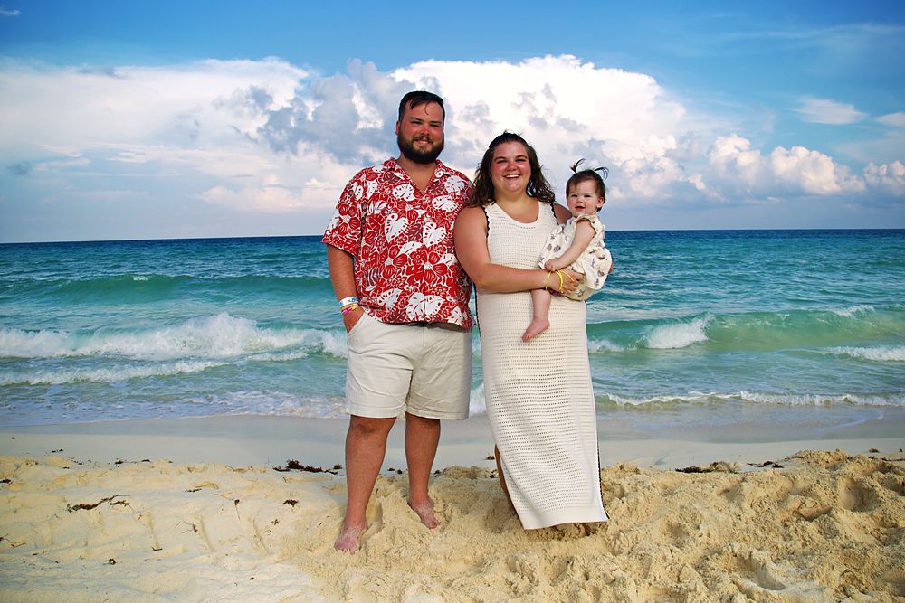 Family of three on the beach