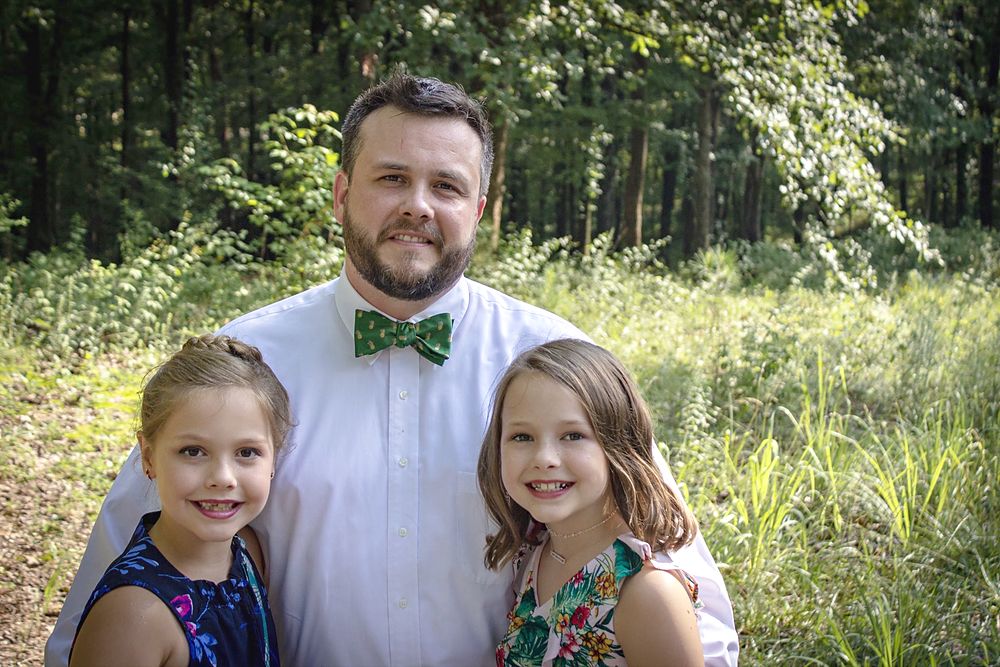 Dad with his two daughters